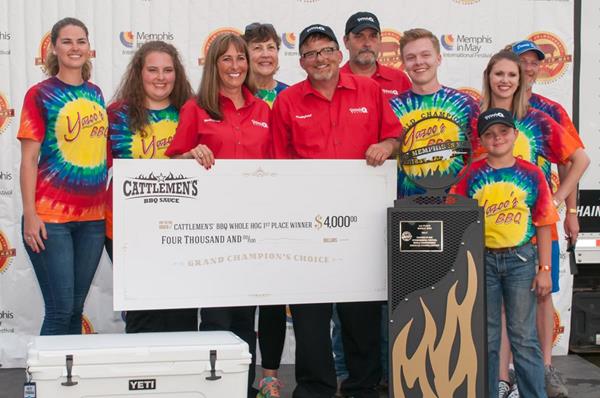 Left to Right - Marissa Roberts, Lauren Cookston, Melissa Cookston, Beverly Weaver (Melissa’s Mother), Pete Cookston, Mark Nichols, Zack Cookston, Chad Nichols, Jessica Dennie, and Ben Dennie of Melissa Cookston’s Yazoo’s Delta Q barbecue team pose with the 1st place trophy in the whole hog category at the 2017 Memphis in May World Championship Barbecue Cooking Contest. PHOTO: Morris Marketing Group
