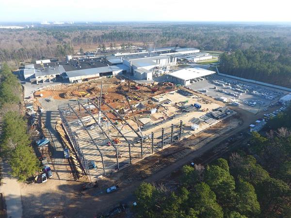 Vertical construction is in progress for a new 222,000 square foot building - the size of nearly four football fields - at JW Aluminum's Goose Creek, South Carolina facility. JW Aluminum will begin installing new, state-of-the-art manufacturing equipment when construction of the new building is complete. 