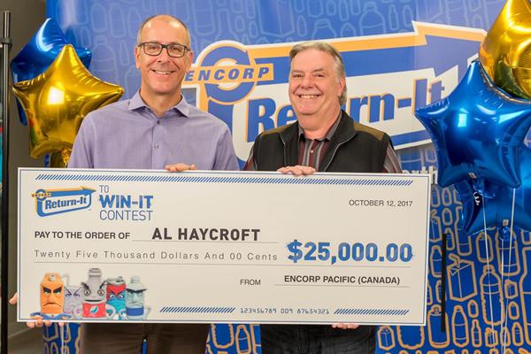 Return-It to Win-It grand prize winner, Al Haycroft with Encorp Pacific President and CEO Scott Fraser