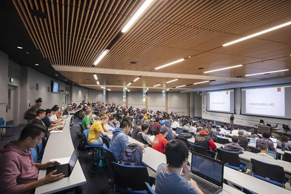 The traditional lecture hall is reimagined to allow for collaborative learning. Image courtesy of LMN Architects.