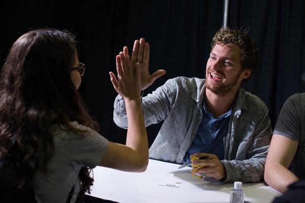 Actor Finn Jones, from the Netflix series Marvel's Iron Fist, greets a fan a Puerto Rico Comic Con 2017