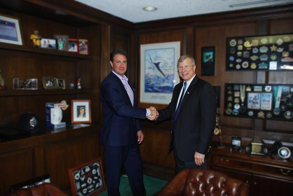 KCI CEO and President Nathan J. Beil, PE, D.WRE, shakes hands with K&S CEO Errol Kalayci to celebrate the acquisition.
