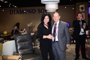 Tawny Lam with Irv Blumkin, CEO of Nebraska Furniture Mart