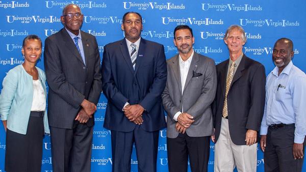 (left to right) UVI Provost Dr. Camille McKayle, UVI President David Hall, Basketball Coach Jeff Jones , Athletic Director Wilberto Ramos,  UVI Soccer Coach Charles Long, and  Track and Field Coach  Dale Joseph pose for a photo. 