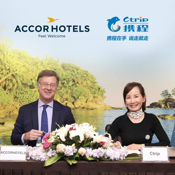 Signing ceremony between AccorHotels CEO Sebastien Bazin and Ctrip CEO Jane Sun