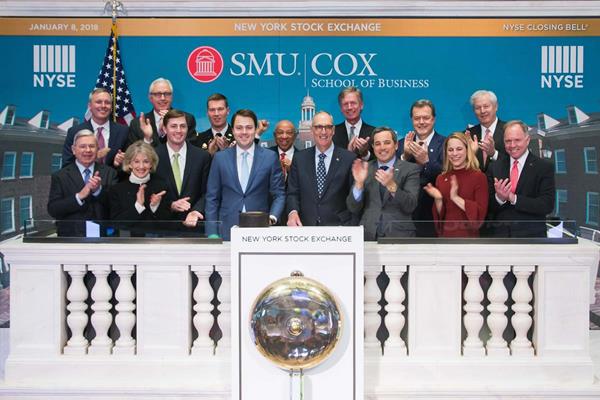 Matthew B. Myers, dean of SMU Cox School of Business, rings The Closing Bell® of the New York Stock Exchange on Monday, January 8, flanked by SMU Board of Trustees members, Cox Executive Board members and alumni. Photo courtesy: NYSE. 