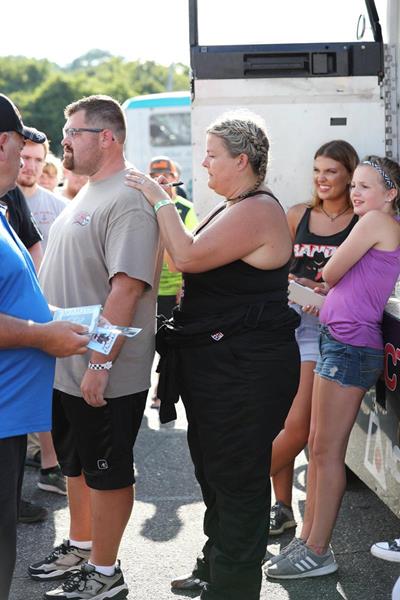Susan Lisenbee, the first female Bandit, signs an autograph for a fan during the Bandit Series meet-and-greet at Hickory Motor Speedway on August 11th.