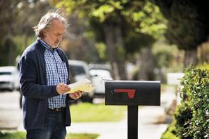 Man at mailbox