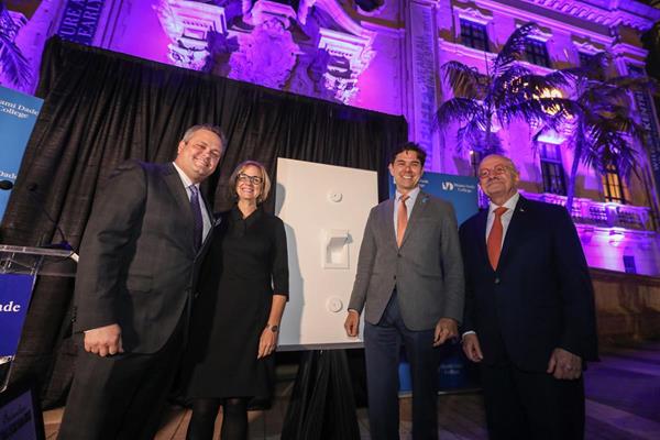 (From left) VITAS CEO Nick Westfall with Commissioners Eileen Higgins and Ken Russell and Miami Dade College's President Eduardo Padron after switching on the purple lights.