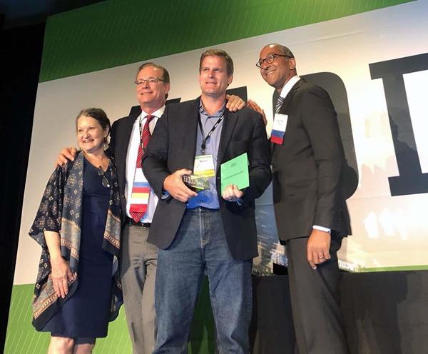 Brett Woudenberg, CEO of MIND Research Institute, and Andrew Coulson, Chief Data Science Officer, received the award in San Francisco on behalf of the organization.