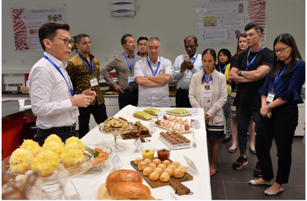 Martin Teo (left), USDEC food applications technical director, leads a May 11-12 U.S. permeate bakery innovation workshop at Singapore Polytechnic’s Food Innovation & Resource Centre (FIRC). Senior food R&D leaders from food companies in Singapore and Malaysia participated. The USDEC-FIRC MOU paves the way for more innovation in Southeast Asia’s food and beverages with  U.S. dairy ingredients.  