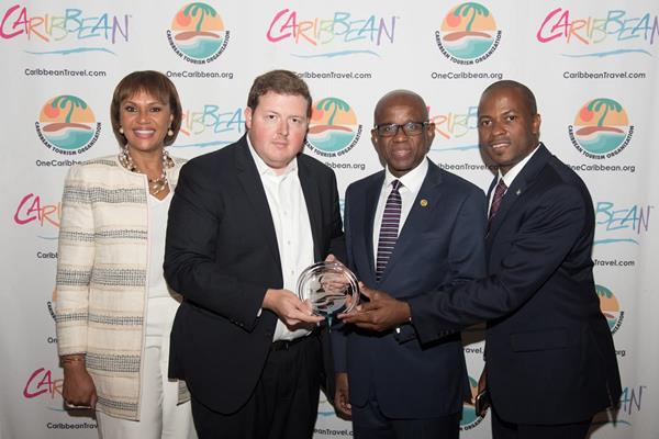 Pictured from left to right; Joy Jibrilu, Director General for The Bahamas; Alexander Brittel, editor-in-chief, Caribbean Journal; Hugh Riley; Secretary General, Caribbean Tourism Organization and Bahamas Senator the Hon. Jamal Moss.