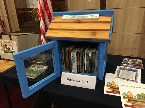 The Little Free Library that was presented to the Alexandria library was handcrafted in the U.S. and painted with a birch tree motif that evokes the region’s woodlands
