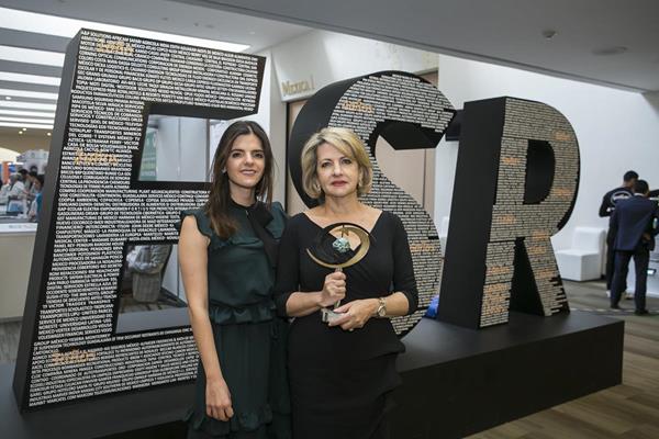 Marianne and Marlene Kafie received the award on behalf of Lacthosa
