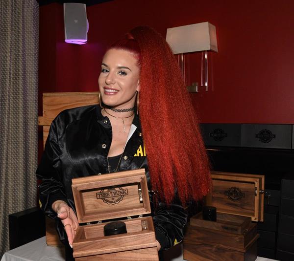MTV Wild N' Out favorite, Justina Valentine, with The Tree Trunk Company luxury cannabis furnishings. 