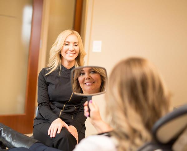 Dr. Tara Hardin of Hardin Advanced Dentistry helping patients smile better as Cincinnati's Top Cosmetic Dentist.  