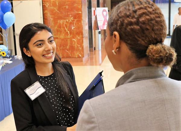 Pangela Dawson (right), founding director of the MSM PA program, chats with one of the 100 students recently interviewing for 20 spots in the first class.