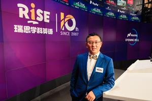 Yiding Sun, Chief Executive Officer, RISE Education, rings the Nasdaq Stock Market Opening Bell