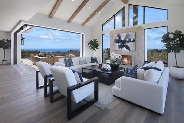 Newly built in 2017, the property showcases contemporary style, high-tech features, ocean views, and stunning design 