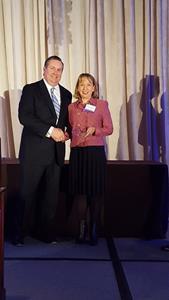 Wendy Marquez, co-founder of Wize Solutions LLC, accepts a 2018 NVTC Tech 100 Award for driving tech innovation, implementing new solutions for their customers, and leading growth, from Jay Farrell, vice-president of sales ePlus. Marquez co-founded Wize Solutions in 2017 to provide a full range of remote IT services to companies across the United States, while bringing 21st century careers to rural communities in Virginia. By providing thriving urban businesses with highly trained and qualified rural IT talent, the company creates a cost-effective alternative to models that offer only onsite and/or offshore sourcing. Wize Solutions provides the economic bridge that allows both urban centers and rural communities to prosper.