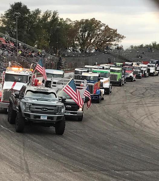 Indomitus, the Minnesota Soybean BioDiesel truck, leads the Bandits around Elko Speedway prior to the start of Saturday’s a-main feature.