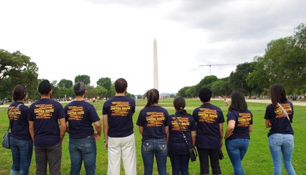 UNITED SIKHS Advocacy & Humanitarian Aid Academy (AHAA) students standing before the National Monument 