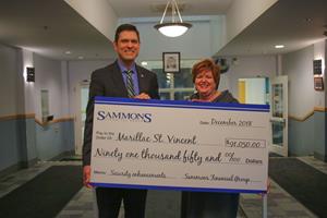 SFG presents check to Marillac St. Vincent