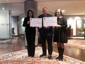 Jonathan Wener remits donation cheques to the local cancer research centres