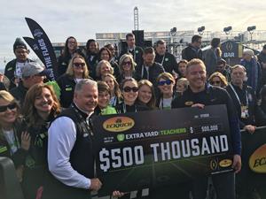Kirk Herbstreit makes 15-yard throw for a $500,000 donation to Extra Yard for Teachers, courtesy of Eckrich®.